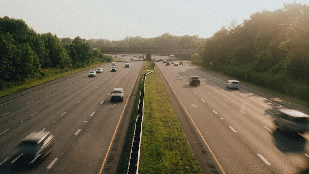 Transport trucks travelling along a highway